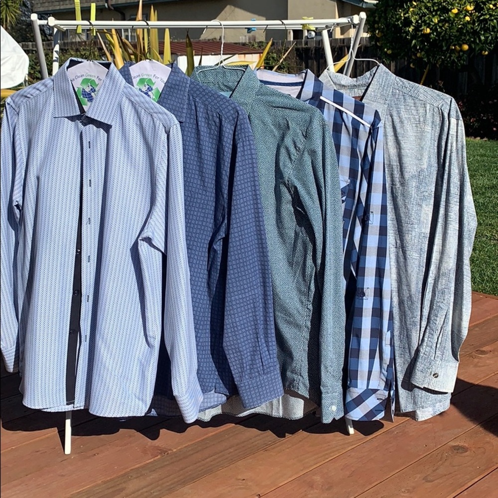 Five long sleeve dress shirts. All in blue tones.